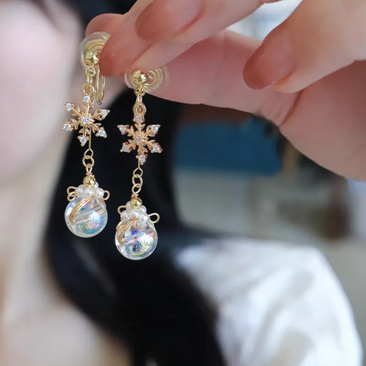 Snowflakes in the aurora borealis / original design glazed snowflakes handmade delicate shiny gold-encrusted earrings
